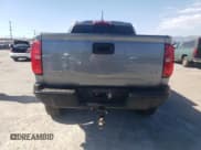 ✅ 2022 Chevrolet Colorado 4WD ZR2 • VIN: 1GCGTEEN4N1310791 • Лот: 70468184. Опубликован ранее на Copart с пробегом 27 006 миль. Бесплатный доступ к архиву аукционных продаж из США и подробный отчёт об истории автомобиля на DreamBid. Изображение 6.