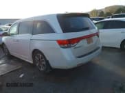 ✅ 2014 Honda Odyssey Touring • VIN: 5FNRL5H94EB129494 • Lot: 43631361. Listed on IAAI with 195,586 mi. Free auction sales archive from the USA and detailed vehicle history report at DreamBid. Image 3.