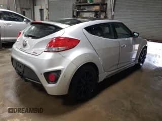 ✅ 2013 Hyundai Veloster Turbo • VIN: KMHTC6AE5DU117827 • Lot: 81896054. Wystawiony na Copart z przebiegiem 183 674 mil. Bezpłatny archiwum sprzedaży aukcyjnych z USA i szczegółowy raport historii pojazdu na DreamBid. Zdjęcie 3.