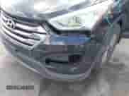 2016 Hyundai Santa Fe z VIN 5XYZUDLB8GG311292, wystawiony jako IAAI lot #43247809 z przebiegiem 169 191 mil mil oraz . Historia ofert i sprzedaży dostępna na DreamBid. Obrazek 6.