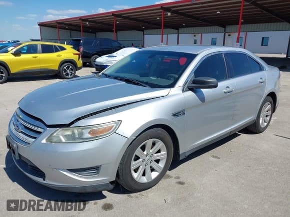 ✅ 2012 Ford Taurus SE • VIN: 1FAHP2DW2CG127083 • Лот: 43319151. Опубликован ранее на IAAI с пробегом 185 462 миль. Бесплатный доступ к архиву аукционных продаж из США и подробный отчёт об истории автомобиля на DreamBid. Изображение 2.