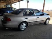 ✅ 1998 Chevrolet Prizm Lsi • VIN: 1Y1SK528XWZ435045 • Lot: 80463624. Listed on Copart with 105,906 mi. Free auction sales archive from the USA and detailed vehicle history report at DreamBid. Image 3.