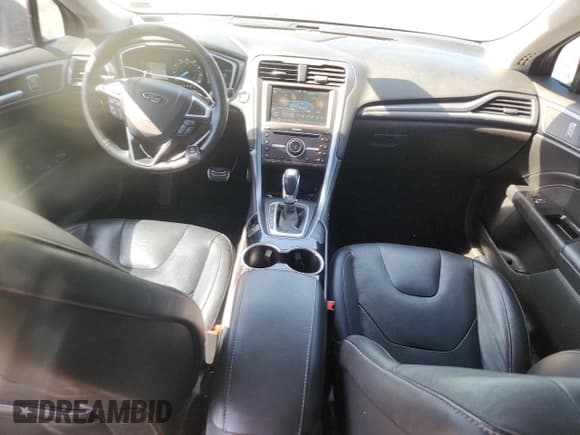 ✅ 2016 Ford Fusion Titanium • VIN: 3FA6P0D9XGR352548 • Lot: 70721425. Listed on Copart with 83,327 mi. Free auction sales archive from the USA and detailed vehicle history report at DreamBid. Image 8.