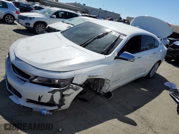 ✅ 2017 Chevrolet Impala LT • VIN: 1G1105S3XHU128588 • Лот: 70126994. Опубликован ранее на Copart с пробегом Не указан. Бесплатный доступ к архиву аукционных продаж из США и подробный отчёт об истории автомобиля на DreamBid. Изображение 1.