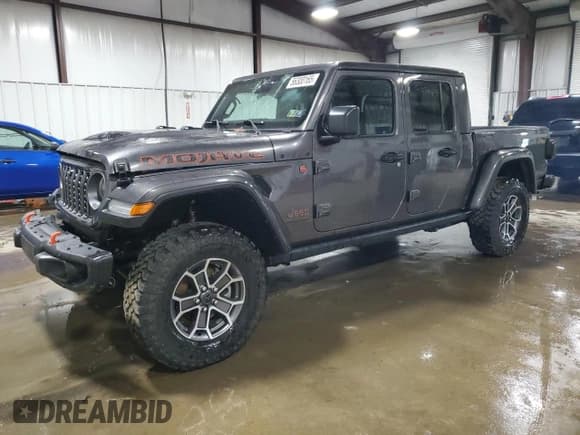 ✅ 2024 Jeep Gladiator Mojave X • VIN: 1C6JJTEG2RL107126 • Lot: 56300165. Wystawiony na Copart z przebiegiem 16 901 mil. Bezpłatny archiwum sprzedaży aukcyjnych z USA i szczegółowy raport historii pojazdu na DreamBid. Zdjęcie 1.