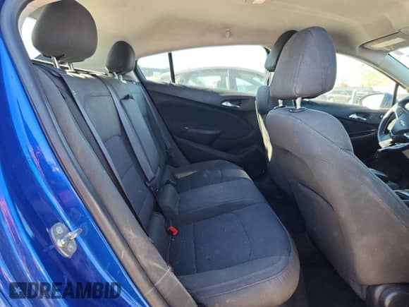 2018 Chevrolet Cruze LT z VIN 3G1BE6SM2JS522970, wystawiony jako Copart lot #87227265 z przebiegiem 94 043 mil mil oraz Czysty tytuł • Clean title. Historia ofert i sprzedaży dostępna na DreamBid. Obrazek 10.