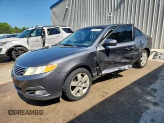 ✅ 2009 Kia Optima SX • VIN: KNAGE224895281652 • Lot: 63225135. Wystawiony na Copart z przebiegiem 128 976 mil. Bezpłatny archiwum sprzedaży aukcyjnych z USA i szczegółowy raport historii pojazdu na DreamBid. Zdjęcie 1.