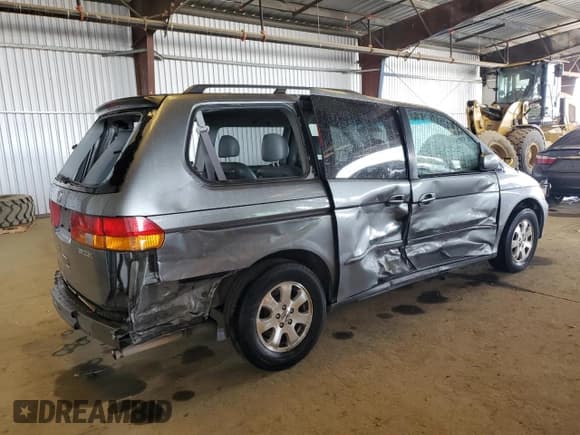 ✅ 2002 Honda Odyssey EX-L • VIN: 2HKRL18952H563137 • Lot: 64602445. Listed on Copart with Not provided. Free auction sales archive from the USA and detailed vehicle history report at DreamBid. Image 3.