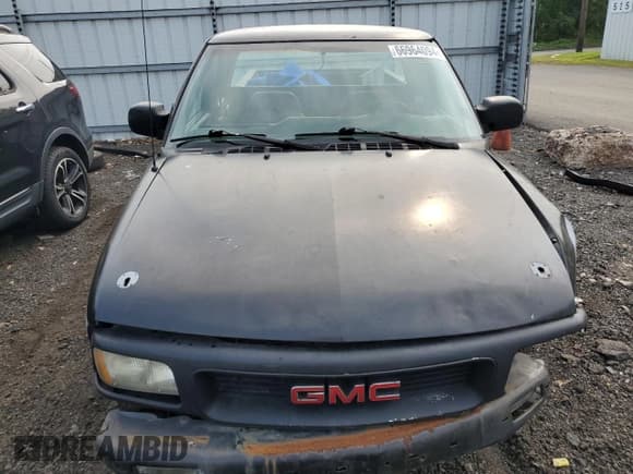 ✅ 1994 GMC Sonoma • VIN: 1GTCS19Z4RK505197 • Lot: 70470204. Wystawiony na Copart z przebiegiem 425 937 mil. Bezpłatny archiwum sprzedaży aukcyjnych z USA i szczegółowy raport historii pojazdu na DreamBid. Zdjęcie 5.