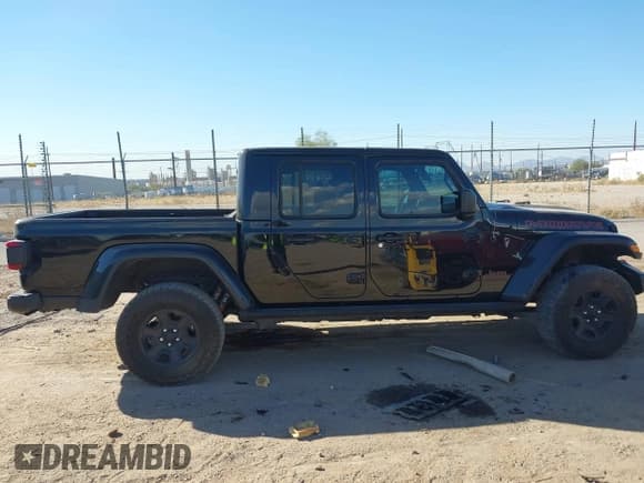 ✅ 2022 Jeep Gladiator Mojave • VIN: 1C6JJTEG7NL180485 • Lot: 41030779. Listed on IAAI with 41,445 mi. Free auction sales archive from the USA and detailed vehicle history report at DreamBid. Image 13.