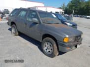 ✅ 1996 Isuzu Rodeo • VIN: 4S2CK58V5T4310439 • Лот: 43089493. Опубликован ранее на IAAI с пробегом 126 998 миль. Бесплатный доступ к архиву аукционных продаж из США и подробный отчёт об истории автомобиля на DreamBid. Изображение 1.