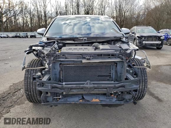 ✅ 2020 Audi Q3 S line Premium • VIN: WA1DECF35L1054165 • Lot: 95489755. Wystawiony na Copart z przebiegiem 49 966 mil. Bezpłatny archiwum sprzedaży aukcyjnych z USA i szczegółowy raport historii pojazdu na DreamBid. Zdjęcie 5.