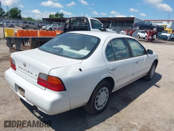 ✅ 1996 Nissan Maxima GXE • VIN: JN1CA21D6TT183479 • Лот: 42374066. Опубликован ранее на IAAI с пробегом 194 346 миль. Бесплатный доступ к архиву аукционных продаж из США и подробный отчёт об истории автомобиля на DreamBid. Изображение 4.