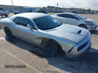 2020 Dodge Challenger R/T with VIN 2C3CDZBT2LH230916, listed as a IAAI auction lot 43128147 with 82,565 mi miles and . Bid and sale history available at DreamBid. Image 1.