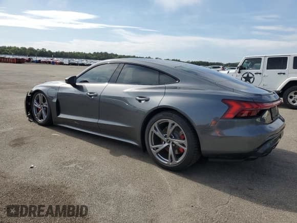 ✅ 2024 Audi e-tron GT Premium Plus • VIN: WAUFJBFWXR7003987 • Лот: 59656755. Опубликован ранее на Copart с пробегом 7 397 миль. Бесплатный доступ к архиву аукционных продаж из США и подробный отчёт об истории автомобиля на DreamBid. Изображение 2.