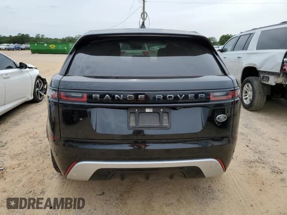 ✅ 2021 Land Rover Range Rover Velar R-Dynamic S • VIN: SALYT2EX1MA304183 • Лот: 56928495. Опубликован ранее на Copart с пробегом 58 316 миль. Бесплатный доступ к архиву аукционных продаж из США и подробный отчёт об истории автомобиля на DreamBid. Изображение 6.