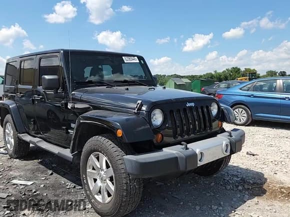 ✅ 2011 Jeep Wrangler Unlimited 70th Anniversary • VIN: 1J4BA7H14BL613844 • Lot: 62983445. Listed on Copart with 143,226 mi. Free auction sales archive from the USA and detailed vehicle history report at DreamBid. Image 13.