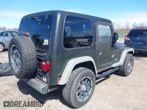 ✅ 2006 Jeep Wrangler SE • VIN: 1J4FA29116P763914 • Lot: 42140140. Listed on IAAI with 107,161 mi. Free auction sales archive from the USA and detailed vehicle history report at DreamBid. Image 4.