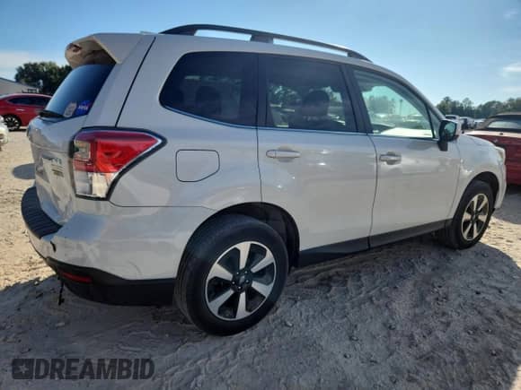 2017 Subaru Forester Limited with VIN JF2SJARCXHH523100, listed as a Copart auction lot 84559495 with 94,988 mi miles and Salvage title. Bid and sale history available at DreamBid. Image 3.