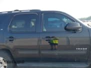 ✅ 2014 Chevrolet Tahoe LT • VIN: 1GNSCBE01ER235571 • Lot: 42403118. Listed on IAAI with 238,069 mi. Free auction sales archive from the USA and detailed vehicle history report at DreamBid. Image 13.