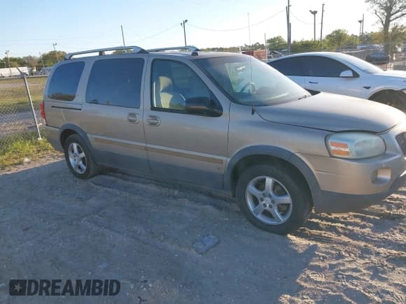 ✅ 2006 Pontiac Montana • VIN: 1GMDV33L16D139948 • Лот: 41740042. Опубликован ранее на IAAI с пробегом 169 209 миль. Бесплатный доступ к архиву аукционных продаж из США и подробный отчёт об истории автомобиля на DreamBid. Изображение 1.