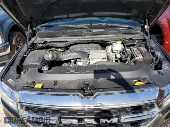 2023 Ram 1500 Lone Star with VIN 1C6RREMT8PN565793, listed as a Copart auction lot 77084184 with 18,825 mi miles and Salvage title. Bid and sale history available at DreamBid. Image 11.