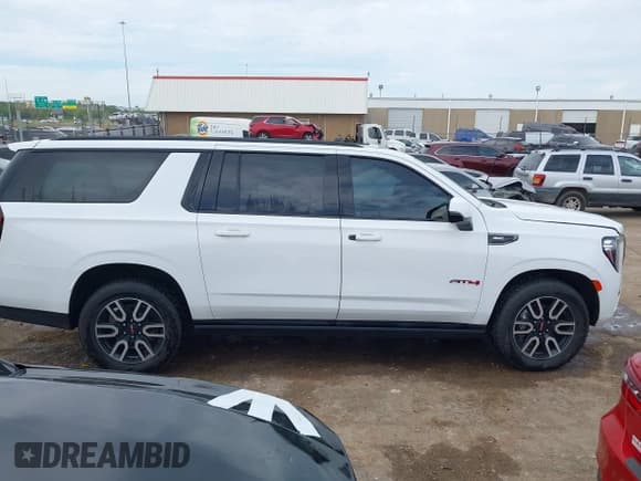 ✅ 2022 GMC Yukon XL AT4 • VIN: 1GKS2HKL4NR150032 • Lot: 42187984. Listed on IAAI with 58,558 mi. Free auction sales archive from the USA and detailed vehicle history report at DreamBid. Image 13.