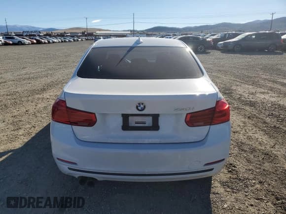 ✅ 2018 BMW 3 Series 330i • VIN: WBA8B9G58JNU99537 • Lot: 82762055. Listed on Copart with 145,569 mi. Free auction sales archive from the USA and detailed vehicle history report at DreamBid. Image 6.
