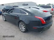 ✅ 2014 Jaguar XJ • VIN: SAJWA1CZ9E8V60522 • Лот: 41919728. Опубликован ранее на IAAI с пробегом 122 184 миль. Бесплатный доступ к архиву аукционных продаж из США и подробный отчёт об истории автомобиля на DreamBid. Изображение 3.