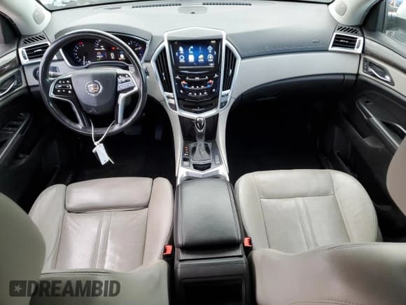 ✅ 2014 Cadillac SRX Performance Collection • VIN: 3GYFNFE35ES548622 • Lot: 89841475. Wystawiony na Copart z przebiegiem 133 815 mil. Bezpłatny archiwum sprzedaży aukcyjnych z USA i szczegółowy raport historii pojazdu na DreamBid. Zdjęcie 8.