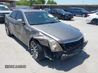 ✅ 2012 Cadillac CTS Premium • VIN: 1G6DP5E36C0143152 • Lot: 42888284. Listed on IAAI with 142,693 mi. Free auction sales archive from the USA and detailed vehicle history report at DreamBid. Image 1.