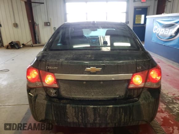 ✅ 2015 Chevrolet Cruze LT • VIN: 1G1PC5SB1F7186979 • Lot: 39162973. Listed on Copart with 130,583 mi. Free auction sales archive from the USA and detailed vehicle history report at DreamBid. Image 6.