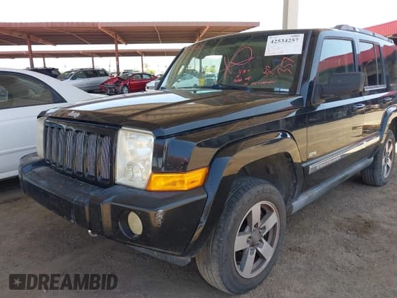 ✅ 2006 Jeep Commander • VIN: 1J8HH48K86C357144 • Lot: 42534257. Listed on IAAI with 218,953 mi. Free auction sales archive from the USA and detailed vehicle history report at DreamBid. Image 2.