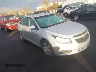 ✅ 2014 Chevrolet Cruze 1LT • VIN: 1G1PC5SB7E7219031 • Lot: 43581337. Listed on IAAI with 150,660 mi. Free auction sales archive from the USA and detailed vehicle history report at DreamBid. Image 1.
