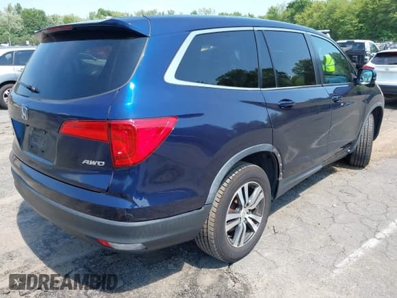 ✅ 2018 Honda Pilot EX-L • VIN: 5FNYF6H5XJB013698 • Lot: 42986201. Listed on IAAI with 63,873 mi. Free auction sales archive from the USA and detailed vehicle history report at DreamBid. Image 4.