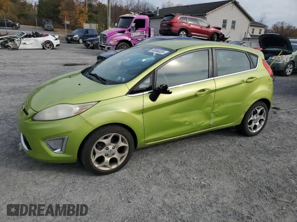 ✅ 2011 Ford Fiesta SES • VIN: 3FADP4FJ9BM147122 • Lot: 90666035. Wystawiony na Copart z przebiegiem 133 206 mil. Bezpłatny archiwum sprzedaży aukcyjnych z USA i szczegółowy raport historii pojazdu na DreamBid. Zdjęcie 1.