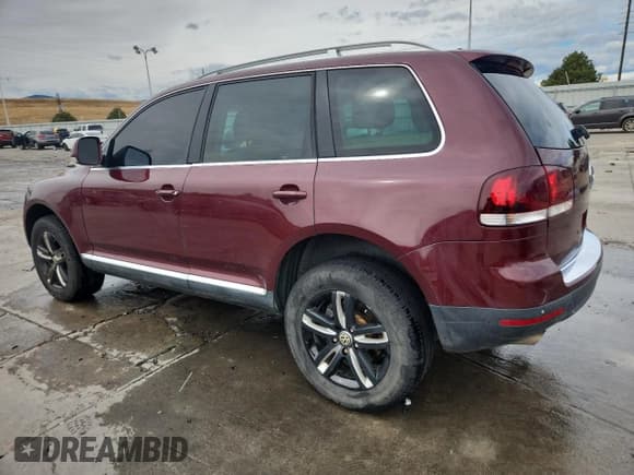 ✅ 2010 Volkswagen Touareg V6 • VIN: WVGFK7A93AD001661 • Lot: 81596405. Listed on Copart with 124,220 mi. Free auction sales archive from the USA and detailed vehicle history report at DreamBid. Image 2.