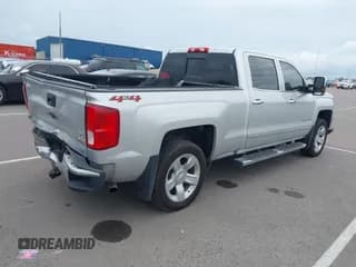 ✅ 2018 Chevrolet Silverado 1500 LTZ • VIN: 3GCUKSEJ6JG433893 • Лот: 42812872. Опубликован ранее на IAAI с пробегом 101 509 миль. Бесплатный доступ к архиву аукционных продаж из США и подробный отчёт об истории автомобиля на DreamBid. Изображение 4.