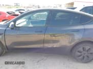 ✅ 2025 Tesla Model Y Long Range • VIN: 7SAYGDED0SA371231 • Lot: 43208101. Listed on IAAI with 7,636 mi. Free auction sales archive from the USA and detailed vehicle history report at DreamBid. Image 14.