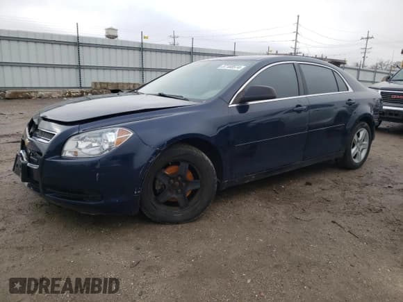 ✅ 2012 Chevrolet Malibu 1LS • VIN: 1G1ZB5E07CF274877 • Lot: 37188574. Listed on Copart with 130,313 mi. Free auction sales archive from the USA and detailed vehicle history report at DreamBid. Image 1.