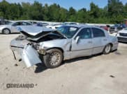 ✅ 1998 Lincoln Town Car Signature • VIN: 1LNFM82W0WY734500 • Lot: 70578805. Listed on Copart with Not provided. Free auction sales archive from the USA and detailed vehicle history report at DreamBid. Image 1.