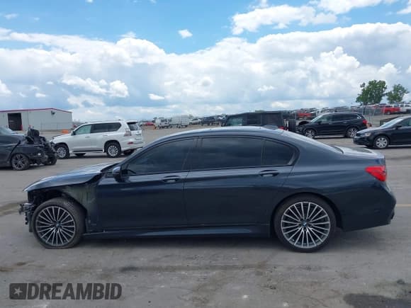 ✅ 2019 BMW 7 Series 740i • VIN: WBA7E2C57KB217844 • Lot: 42378704. Listed on IAAI with 73,139 mi. Free auction sales archive from the USA and detailed vehicle history report at DreamBid. Image 14.
