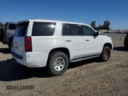 ✅ 2018 Chevrolet Tahoe Commercial • VIN: 1GNSKFEC9JR125673 • Lot: 84300825. Listed on Copart with 84,037 mi. Free auction sales archive from the USA and detailed vehicle history report at DreamBid. Image 3.