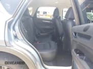 ✅ 2023 Mazda CX-5 S Carbon Edition • VIN: JM3KFBCM2P0200445 • Lot: 42745392. Listed on IAAI with 21,932 mi. Free auction sales archive from the USA and detailed vehicle history report at DreamBid. Image 8.