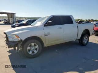 2021 Ram 1500 SLT с VIN 1C6RR6LG9MS529991, выставлен на аукционе Copart как лот 66213855 с пробегом 112 047 миль миль и Списание • Salvage title. История ставок и продаж доступна на DreamBid. Изображение 1.