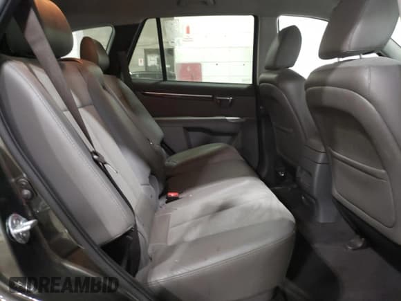 ✅ 2012 Hyundai Santa Fe SE • VIN: 5XYZH4AG3CG117525 • Lot: 75181374. Listed on Copart with 96,764 mi. Free auction sales archive from the USA and detailed vehicle history report at DreamBid. Image 11.