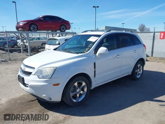 ✅ 2013 Chevrolet Captiva Sport LT • VIN: 3GNAL3EK3DS621634 • Lot: 41888913. Wystawiony na IAAI z przebiegiem 148 856 mil. Bezpłatny archiwum sprzedaży aukcyjnych z USA i szczegółowy raport historii pojazdu na DreamBid. Zdjęcie 2.