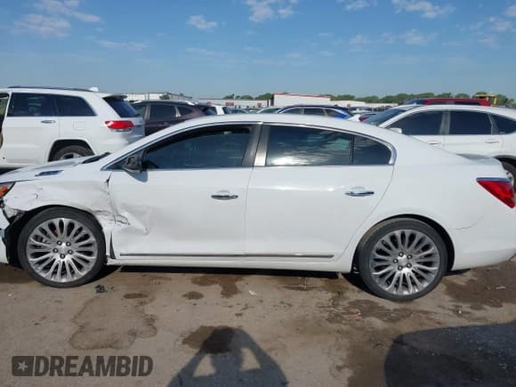 ✅ 2014 Buick LaCrosse Premium II • VIN: 1G4GF5G3XEF202760 • Lot: 42251920. Wystawiony na IAAI z przebiegiem 121 177 mil. Bezpłatny archiwum sprzedaży aukcyjnych z USA i szczegółowy raport historii pojazdu na DreamBid. Zdjęcie 14.