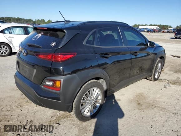 ✅ 2021 Hyundai Kona SEL • VIN: KM8K22AA7MU704292 • Lot: 82484943. Wystawiony na Copart z przebiegiem 59 604 mil. Bezpłatny archiwum sprzedaży aukcyjnych z USA i szczegółowy raport historii pojazdu na DreamBid. Zdjęcie 3.