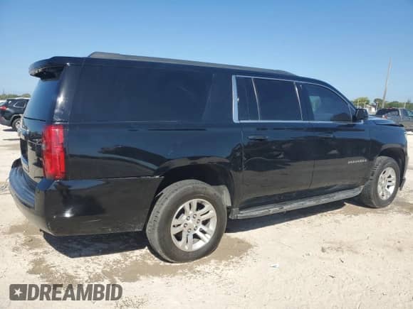 2018 Chevrolet Suburban LS с VIN 1GNSCGEC6JR300464, выставлен на аукционе Copart как лот 49809615 с пробегом 54 298 миль миль и Списание • Salvage title. История ставок и продаж доступна на DreamBid. Изображение 3.